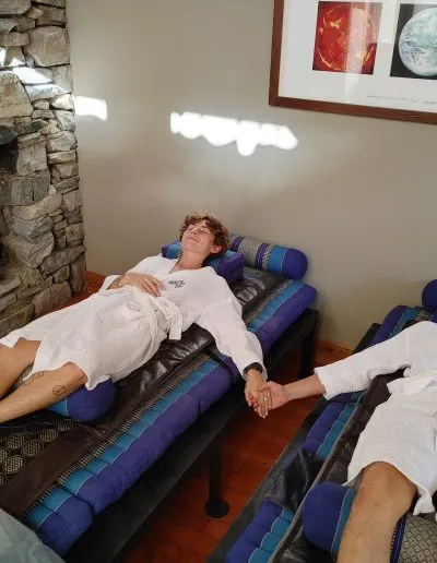 savasana holding hands